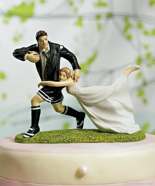 A Love Match Rugby Couple Figurine