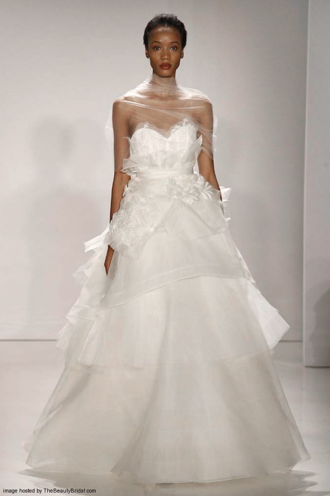 Amsale Fall 2015 ball gown organza wedding dress with a sheer neckline sweetheart bodice and silk flower tiered skirt