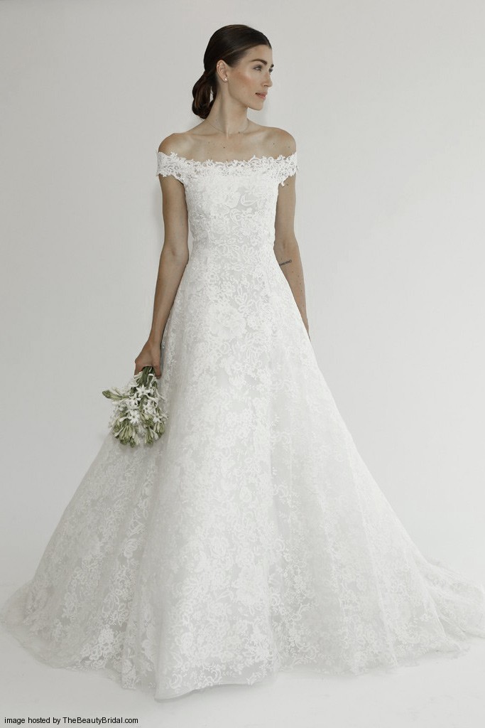 Oscar de la Renta luxury off the shoulder A line wedding dress with delicate lace details