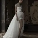 Vera Wang Spring 2016 high low hem wedding gown with lace illusion neck and a corset bodice