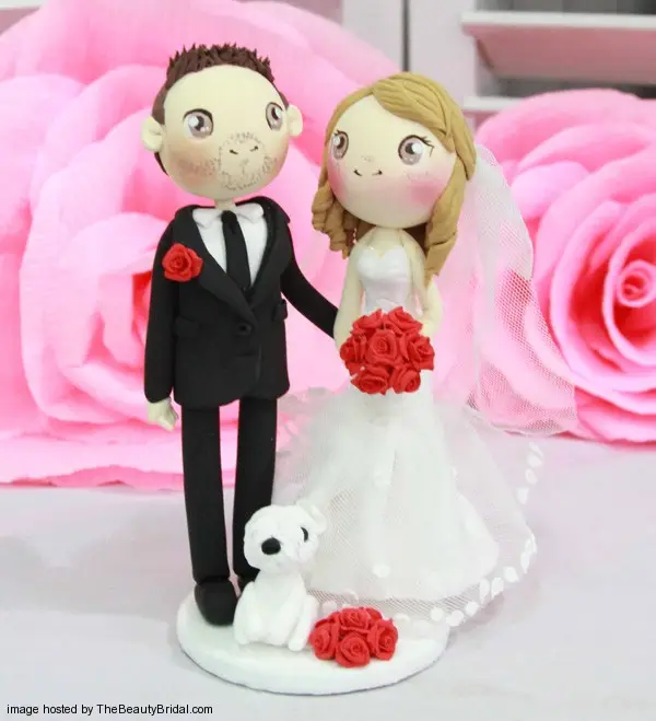 Wedding Cake topper Bride wears sweetheart dress with a cute puppy