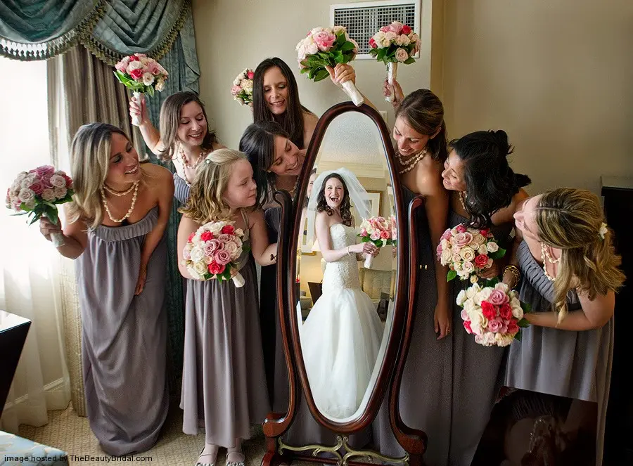 funny wedding pho to Bridesmaids flower girls and the bride