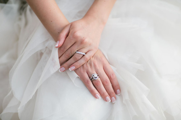 wedding photo bride wears gorgeous engagement ring 600x399 1